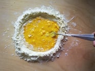 Ravioli mele e speck